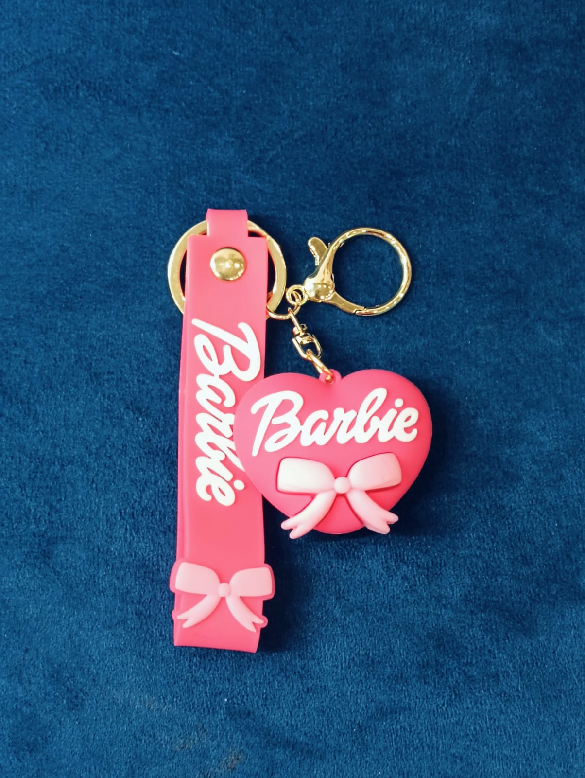 Embrace effortless elegance with PVC Dark Pink Heart Keychain