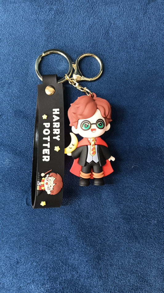 Unleash the Magic with the Harry Potter Black and Red Dress Enchanted PVC Keychain!